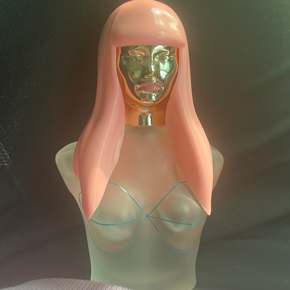 Nicki Minaj fragrance pink hair gold bottle